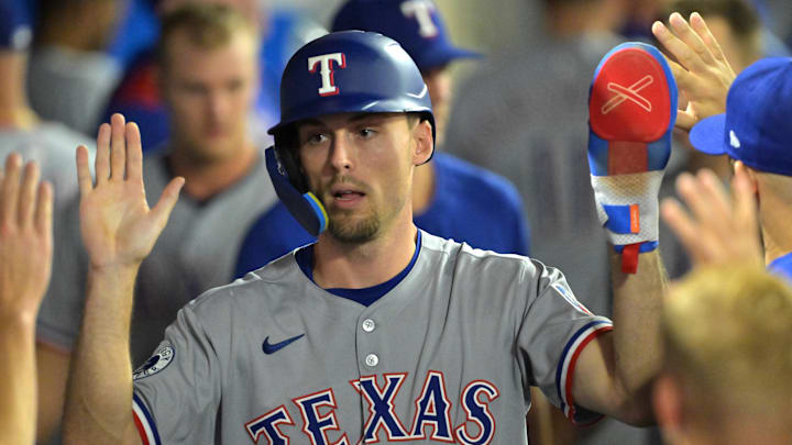 Texas Rangers center fielder Evan Carter (32) in the dugout after scoring a run in the eighth inning against the Los Angeles Angels at Angel Stadium. Texas Rangers center fielder Evan Carter (32) in the dugout after scoring a run in the eighth inning against the Los Angeles Angels at Angel Stadium.