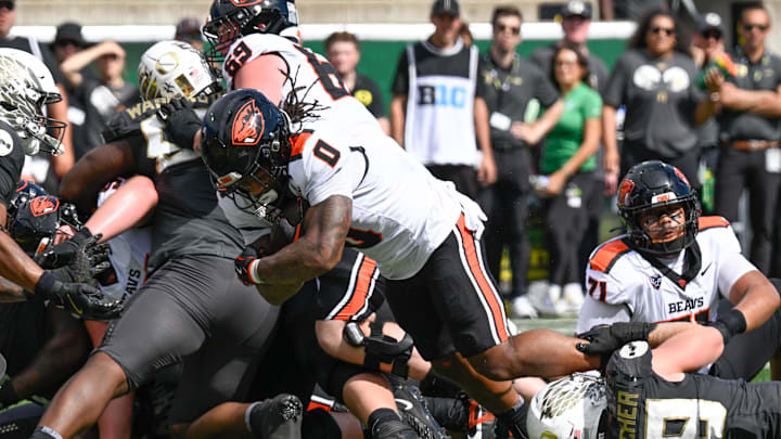 Sep 20, 2025; Eugene, Oregon, USA; Oregon State Beavers running back Anthony Hankerson (0) carries the ball for a touchdown against the Oregon Ducks during the first quarter of the game at Autzen Stadium. Mandatory Credit: Troy Wayrynen-Imagn Images Sep 20, 2025; Eugene, Oregon, USA; Oregon State Beavers running back Anthony Hankerson (0) carries the ball for a touchdown against the Oregon Ducks during the first quarter of the game at Autzen Stadium. Mandatory Credit: Troy Wayrynen-Imagn Images