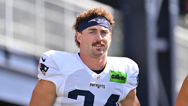 Jul 28, 2025; Foxborough, MA, USA; New England Patriots running back Lan Larison (34) heads to the practice fields for training camp at Gillette Stadium. Mandatory Credit: Eric Canha-Imagn Images