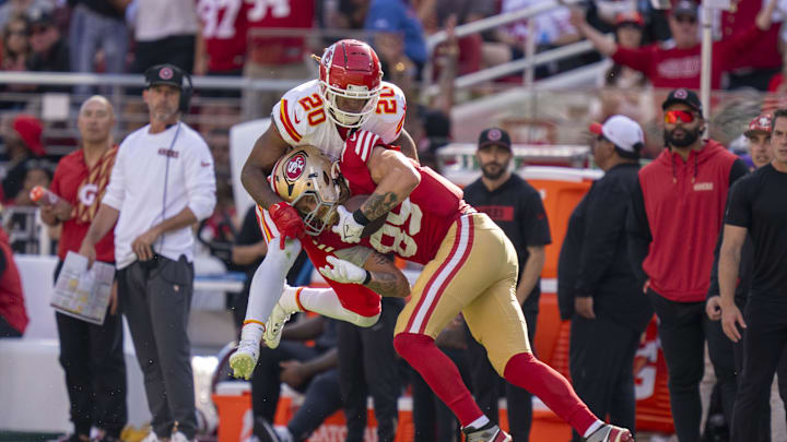 October 20, 2024; Santa Clara, California, USA; San Francisco 49ers tight end George Kittle (85) catches the football against Kansas City Chiefs safety Justin Reid (20) during the second quarter at Levi's Stadium. Mandatory Credit: Kyle Terada-Imagn Images October 20, 2024; Santa Clara, California, USA; San Francisco 49ers tight end George Kittle (85) catches the football against Kansas City Chiefs safety Justin Reid (20) during the second quarter at Levi's Stadium. Mandatory Credit: Kyle Terada-Imagn Images