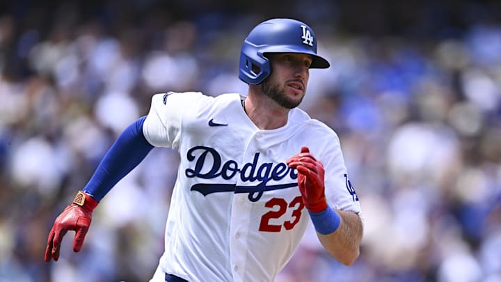 Apr 26, 2026; Los Angeles, California, USA; Los Angeles Dodgers right fielder Kyle Tucker (23) runs after hitting a double against the Chicago Cubs in the first inning at Dodger Stadium. Mandatory Credit: Jonathan Hui-Imagn Images