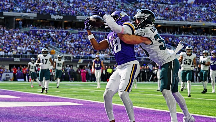 Oct 19, 2025; Minneapolis, Minnesota, USA; Minnesota Vikings wide receiver Justin Jefferson (18) is unable to make a catch during the second half after being blocked by Philadelphia Eagles cornerback Cooper Dejean (33) at U.S. Bank Stadium. Mandatory Credit: Jeffrey Becker-Imagn Images