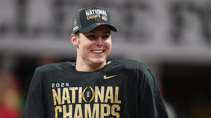 Jan 20, 2025; Atlanta, GA, USA; Ohio State Buckeyes quarterback Will Howard (18) on the podium after defeating the Notre Dame Fighting Irish in the CFP National Championship college football game at Mercedes-Benz Stadium. Mandatory Credit: Kirby Lee-Imagn Images