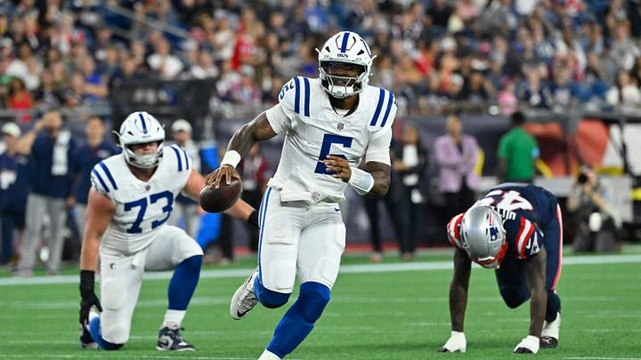 Aug 13, 2026; Foxborough, Massachusetts, USA; Indianapolis Colts quarterback Anthony Richardson Sr. (5) scrambles with the ball during the first half against the New England Patriots at Gillette Stadium. Mandatory Credit: Eric Canha-Imagn Images