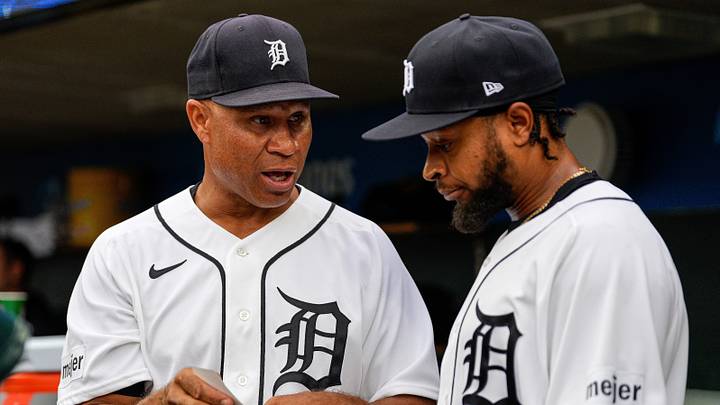 Tigers first base coach Anthony Sanders (99) talks to right fielder Corey Julks (44) before the first inning against the Guardians. Tigers first base coach Anthony Sanders (99) talks to right fielder Corey Julks (44) before the first inning against the Guardians.