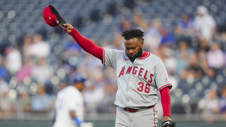 Aug 21, 2024; Kansas City, Missouri, USA; Los Angeles Angels starting pitcher Johnny Cueto (36) reacts after retiring Kansas City Royals catcher Salvador Perez (13) during the first inning at Kauffman Stadium. Mandatory Credit: Jay Biggerstaff-USA TODAY Sports Aug 21, 2024; Kansas City, Missouri, USA; Los Angeles Angels starting pitcher Johnny Cueto (36) reacts after retiring Kansas City Royals catcher Salvador Perez (13) during the first inning at Kauffman Stadium. Mandatory Credit: Jay Biggerstaff-USA TODAY Sports