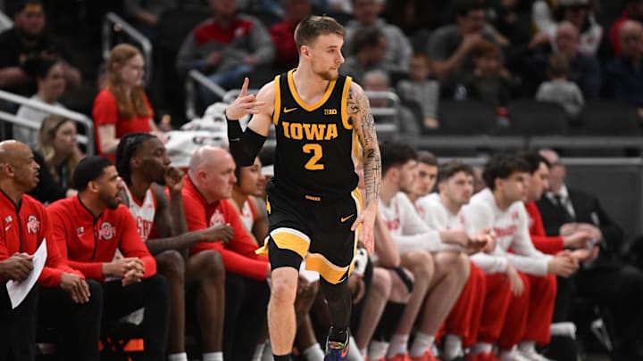 Mar 12, 2025; Indianapolis, IN, USA; Iowa Hawkeyes guard Brock Harding (2) celebrates after making a three-point basket during the first half against the Ohio State Buckeyes at Gainbridge Fieldhouse. Mandatory Credit: Robert Goddin-Imagn Images Mar 12, 2025; Indianapolis, IN, USA; Iowa Hawkeyes guard Brock Harding (2) celebrates after making a three-point basket during the first half against the Ohio State Buckeyes at Gainbridge Fieldhouse. Mandatory Credit: Robert Goddin-Imagn Images