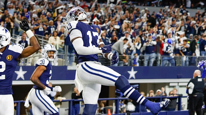 Dallas Cowboys linebacker DeMarvion Overshown celebrates his interception touchdown vs. the New York Giants
