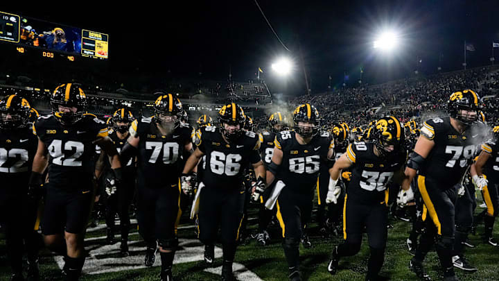 The Iowa Hawkeyes swarm into the tunnel after defeating the Nebraska Cornhuskers 13-10 Friday, Nov. 29, 2024 at Kinnick Stadium in Iowa City, Iowa. The Iowa Hawkeyes swarm into the tunnel after defeating the Nebraska Cornhuskers 13-10 Friday, Nov. 29, 2024 at Kinnick Stadium in Iowa City, Iowa.