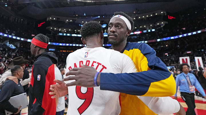 Nov 18, 2024; Toronto, Ontario, CAN; Indiana Pacers forward Pascal Siakam (43) hugs Toronto Raptors guard RJ Barrett (9) at the end of the fourth quarter at Scotiabank Arena. Mandatory Credit: Nick Turchiaro-Imagn Images