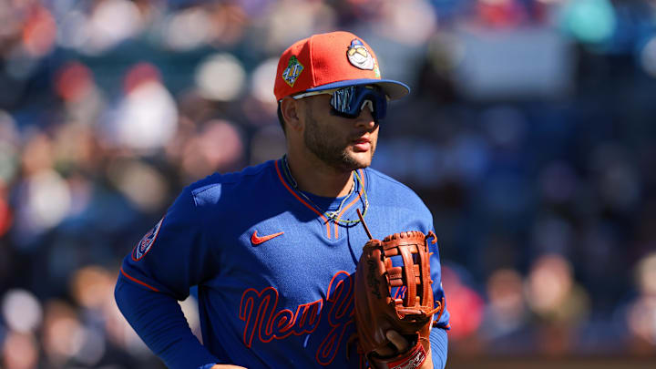 Feb 24, 2026; Port St. Lucie, Florida, USA; New York Mets third baseman Bo Bichette (19) returns to the dugout against the Houston Astros during the third inning at Clover Park. Mandatory Credit: Sam Navarro-Imagn Images
