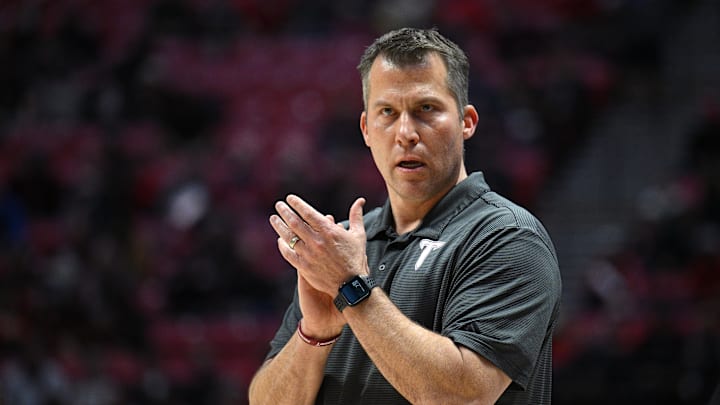Dec 5, 2022; San Diego, California, USA; Troy Trojans head coach Scott Cross looks on during the first half against the San Diego State Aztecs at Viejas Arena. Mandatory Credit: Orlando Ramirez-Imagn Images