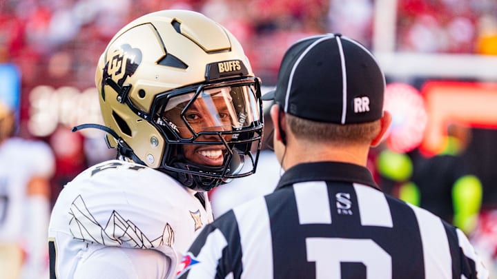 Sep 7, 2024; Lincoln, Nebraska, USA; Colorado Buffaloes safety Shilo Sanders (21) talks with an official before the game against the Nebraska Cornhuskers at Memorial Stadium. Mandatory Credit: Dylan Widger-Imagn Images