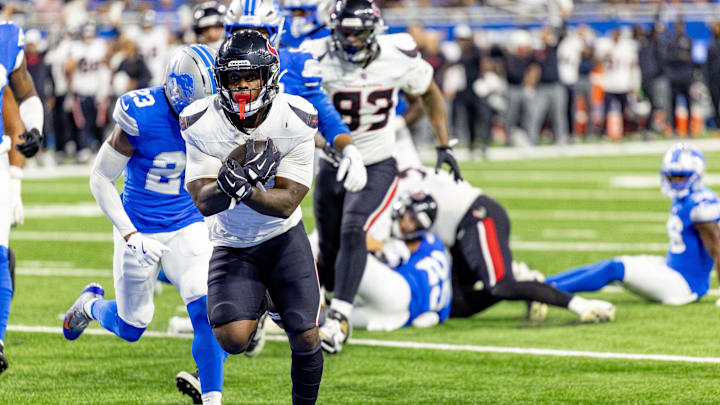 Aug 23, 2025; Detroit, Michigan, USA; Houston Texans running back Woody Marks (27) runs with the ball for a touchdown in front of Detroit Lions cornerback Rock Ya-Sin (23) during the first half at Ford Field. Mandatory Credit: David Reginek-Imagn Images Aug 23, 2025; Detroit, Michigan, USA; Houston Texans running back Woody Marks (27) runs with the ball for a touchdown in front of Detroit Lions cornerback Rock Ya-Sin (23) during the first half at Ford Field. Mandatory Credit: David Reginek-Imagn Images