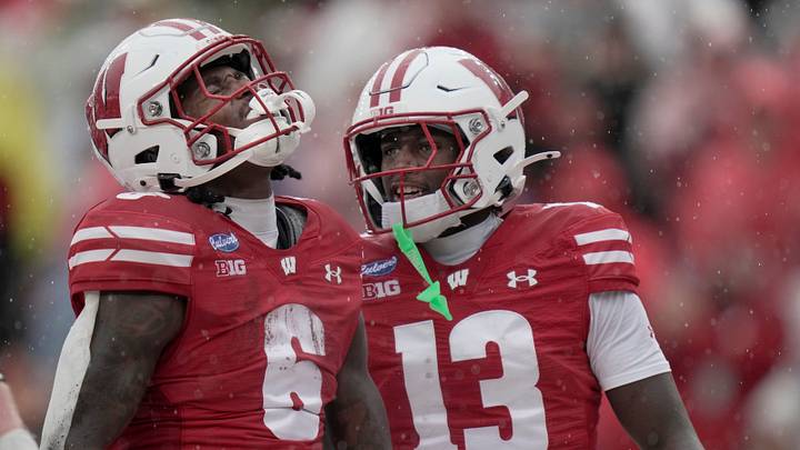 Wisconsin running back Darrion Dupree (6) celebrates his touchdown run with wide receiver Eugene Hilton Jr. (13) during the second quarter of their game against Eastern Michigan Saturday, Sept. 19, 2026 at Camp Randall Stadium in Madison, Wisconsin.