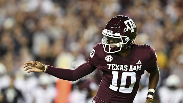 Nov 16, 2024; College Station, Texas, USA; Texas A&M Aggies quarterback Marcel Reed (10) watches the play during the first quarter against the New Mexico State Aggies at Kyle Field. Mandatory Credit: Maria Lysaker-Imagn Images 