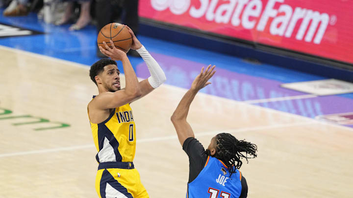 Jun 8, 2025; Oklahoma City, Oklahoma, USA; Indiana Pacers guard Tyrese Haliburton (0) shoots the ball against Oklahoma City Thunder guard Isaiah Joe (11) during the first quarter during game two of the 2025 NBA Finals at Paycom Center. Mandatory Credit: Kyle Terada-Imagn Images Jun 8, 2025; Oklahoma City, Oklahoma, USA; Indiana Pacers guard Tyrese Haliburton (0) shoots the ball against Oklahoma City Thunder guard Isaiah Joe (11) during the first quarter during game two of the 2025 NBA Finals at Paycom Center. Mandatory Credit: Kyle Terada-Imagn Images