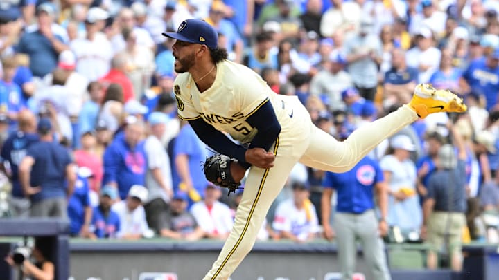 Oct 4, 2025; Milwaukee, Wisconsin, USA; Milwaukee Brewers starting pitcher Freddy Peralta (51) pitches against the Chicago Cubs during the second inning of game one of the NLDS round for the 2025 MLB playoffs at American Family Field. Mandatory Credit: Benny Sieu-Imagn Images