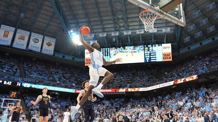 Jan 21, 2026; Chapel Hill, North Carolina, USA; North Carolina Tar Heels forward Caleb Wilson (8) scores in the second half at Dean E. Smith Center. Mandatory Credit: Bob Donnan-Imagn Images