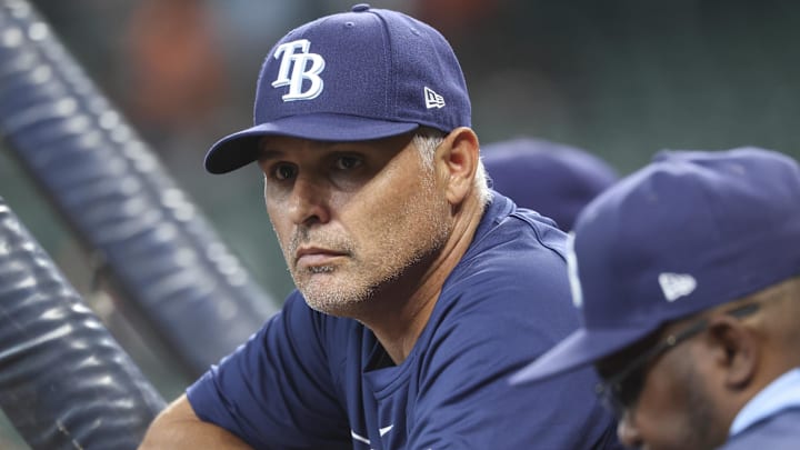 Tampa Bay Rays manager Kevin Cash (16) watches during batting practice before the game against the Houston Astros at Daikin Park./ Troy Taormina-Imagn Images