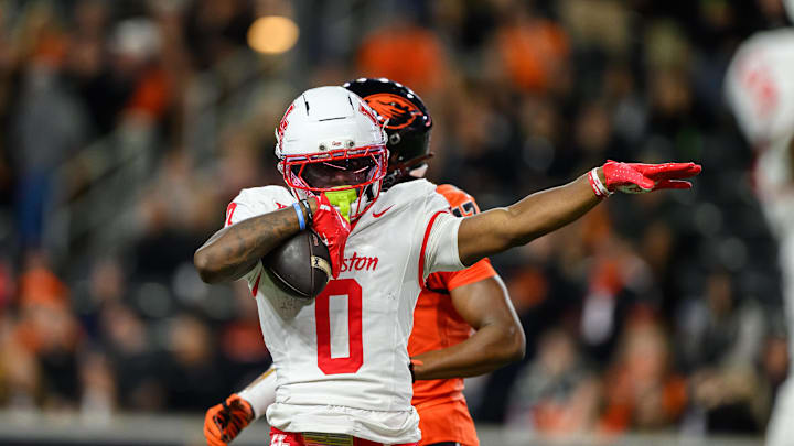 Sep 26, 2025; Corvallis, Oregon, USA; Houston Cougars wide receiver Amare Thomas (0) celebrates a catch and first down during the second quarter against the Oregon State Beavers at Reser Stadium. Mandatory Credit: Craig Strobeck-Imagn Images