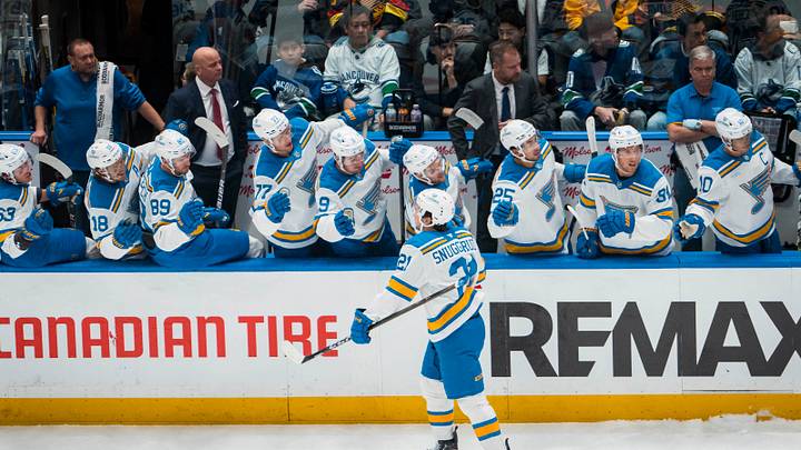 Oct 13, 2025; Vancouver, British Columbia, CAN; St. Louis Blues forward Jimmy Snuggerud (21) celebrates his goal against the Vancouver Canucks in the first period at Rogers Arena. Mandatory Credit: Bob Frid-Imagn Images