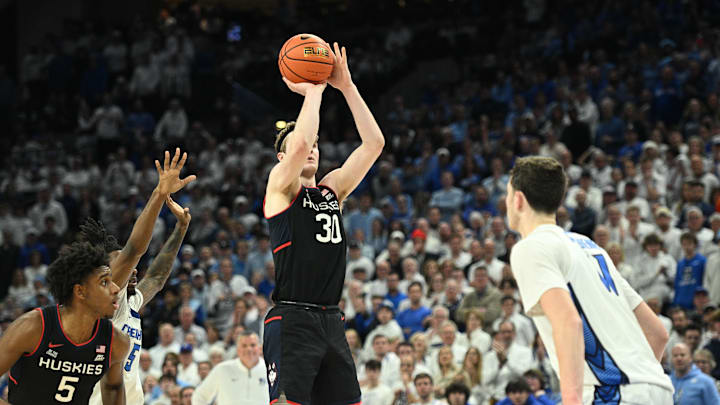 Feb 11, 2025; Omaha, Nebraska, USA; Connecticut Huskies forward Liam McNeeley (30) shoots against the Creighton Bluejays during the second half at CHI Health Center Omaha. Mandatory Credit: Steven Branscombe-Imagn Images Feb 11, 2025; Omaha, Nebraska, USA; Connecticut Huskies forward Liam McNeeley (30) shoots against the Creighton Bluejays during the second half at CHI Health Center Omaha. Mandatory Credit: Steven Branscombe-Imagn Images