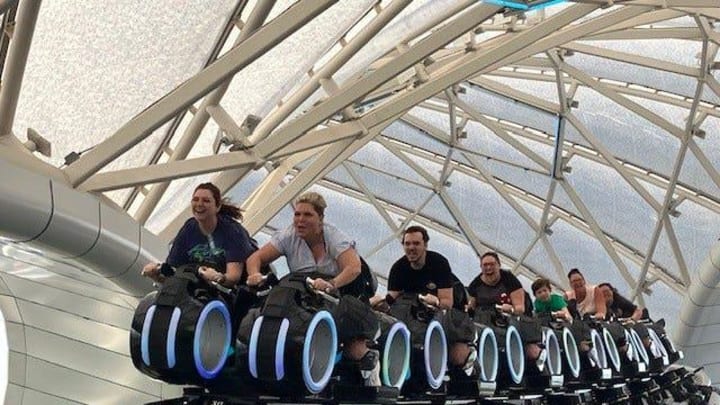 Riders whiz through the dome and prepare to enter the Grid on TRON Lightcycle/Run at Walt Disney