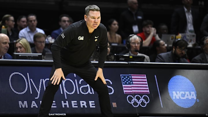 Mar 22, 2026; San Diego, CA, USA; Arizona Wildcats head coach Tommy Lloyd reacts in the first half against the Utah State Aggies during a second round game of the men's 2026 NCAA Tournament at Viejas Arena. Mandatory Credit: Denis Poroy-Imagn Images