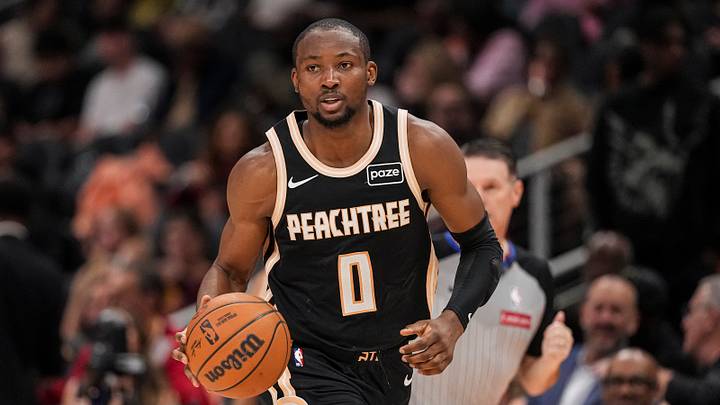 Feb 26, 2026; Atlanta, Georgia, USA; Atlanta Hawks forward Jonathan Kuminga (0) brings the ball up the court against the Washington Wizards during the second half at State Farm Arena.
