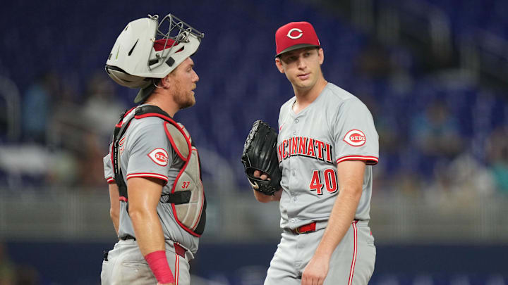 Aug 6, 2024; Miami, Florida, USA; Cincinnati Reds starting pitcher Nick Lodolo (40) gets a visit at the mound from catcher Tyler Stephenson (37) in the fourth inning against the Miami Marlins at loanDepot Park. Mandatory Credit: Jim Rassol-Imagn Images Aug 6, 2024; Miami, Florida, USA; Cincinnati Reds starting pitcher Nick Lodolo (40) gets a visit at the mound from catcher Tyler Stephenson (37) in the fourth inning against the Miami Marlins at loanDepot Park. Mandatory Credit: Jim Rassol-Imagn Images