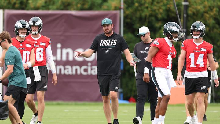 Jul 30, 2026; Philadelphia, PA, USA; Philadelphia Eagles  offensive coordinator Sean Mannion and quarterbacks Jalen Hurts (1) and Andy Dalton (14) and Cole Payton (10) and Tanner McKee (16) during training camp at Jefferson Health Training Complex. 