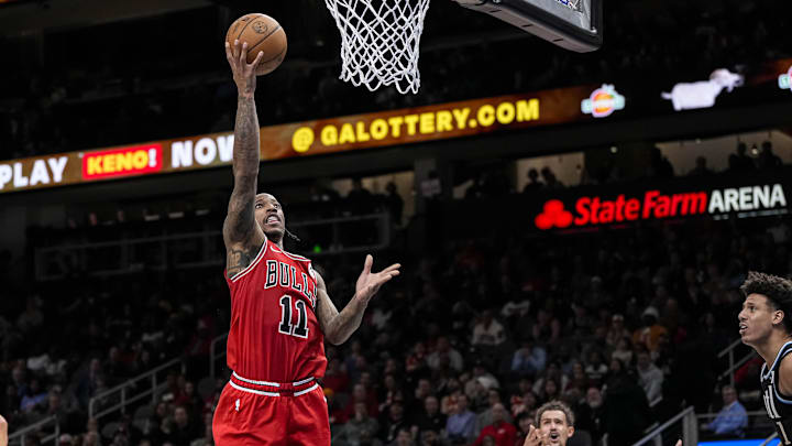 Feb 12, 2024; Atlanta, Georgia, USA; Chicago Bulls forward DeMar DeRozan (11) scores a basket