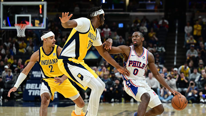 Oct 27, 2024; Indianapolis, Indiana, USA; Philadelphia 76ers guard Tyrese Maxey (0) dribbles the ball in front of Indiana Pacers center Myles Turner (33) during overtime at Gainbridge Fieldhouse. Mandatory Credit: Marc Lebryk-Imagn Images Oct 27, 2024; Indianapolis, Indiana, USA; Philadelphia 76ers guard Tyrese Maxey (0) dribbles the ball in front of Indiana Pacers center Myles Turner (33) during overtime at Gainbridge Fieldhouse. Mandatory Credit: Marc Lebryk-Imagn Images
