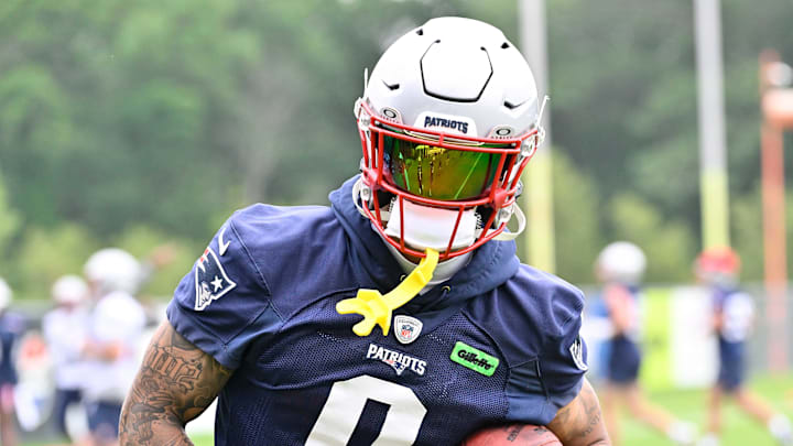Jun 9, 2025; Foxborough, MA, USA; New England Patriots cornerback Christian Gonzalez (0) runs after the catch during minicamp at Gillette Stadium. Mandatory Credit: Eric Canha-Imagn Images