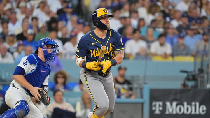 Oct 15, 2026; Los Angeles, California, USA; Milwaukee Brewers first baseman Jake Bauers (9) hits a two RBI double against the Los Angeles Dodgers during the fourth inning in game four of the NLCS for the 2026 MLB Playoffs at Uniqlo Field at Dodger Stadium. Mandatory Credit: Jayne Kamin-Oncea-Imagn Images Oct 15, 2026; Los Angeles, California, USA; Milwaukee Brewers first baseman Jake Bauers (9) hits a two RBI double against the Los Angeles Dodgers during the fourth inning in game four of the NLCS for the 2026 MLB Playoffs at Uniqlo Field at Dodger Stadium. Mandatory Credit: Jayne Kamin-Oncea-Imagn Images