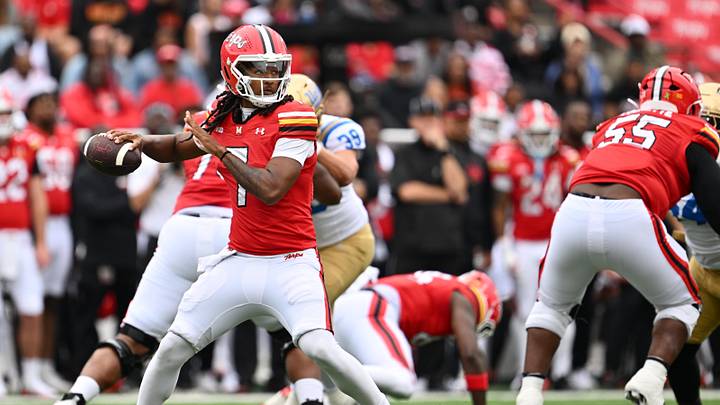 Maryland Terrapins quarterback Malik Washington (7) passes in the first half against the UCLA Bruins at SECU Stadium. Maryland Terrapins quarterback Malik Washington (7) passes in the first half against the UCLA Bruins at SECU Stadium.
