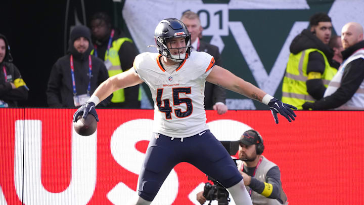 Oct 12, 2025; Tottenham, United Kingdom; Denver Broncos tight end Nate Adkins (45) celebrates a touchdown against the New York Jets during an NFL International Series game at Tottenham Hotspur Stadium. Mandatory Credit: Kirby Lee-Imagn Images