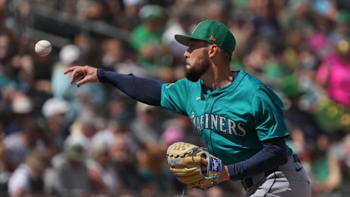 Seattle Mariners pitcher Casey Lawrence throws against the Oakland Athletics in the third inning at Hohokam Stadium on March 17.