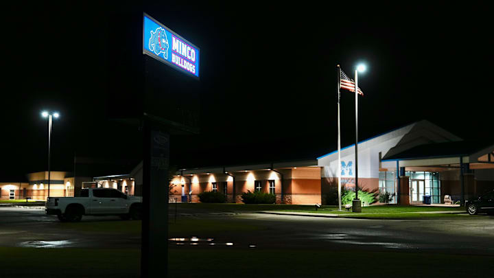 A projection of the Minco softball team is displayed on an LED sign outside of Minco High School on early Tuesday, Sep. 9, 2025.