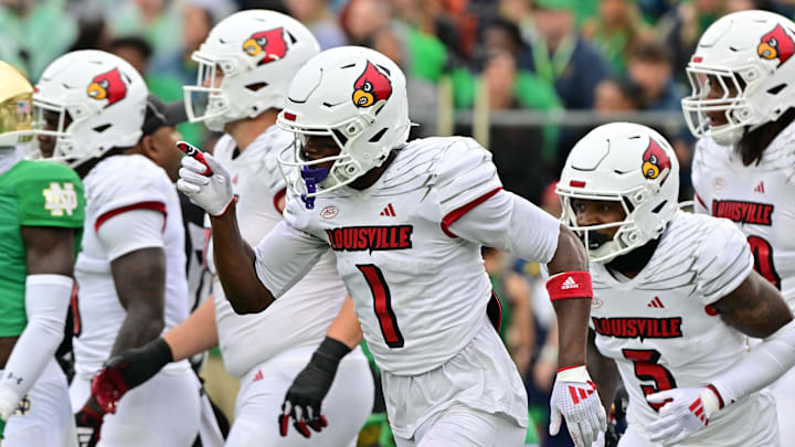 Sep 28, 2024; South Bend, Indiana, USA; Louisville Cardinals wide receiver Ja'Corey Brooks (1) celebrates after a touchdown catch against the Notre Dame Fighting Irish in the second quarter at Notre Dame Stadium. Mandatory Credit: Matt Cashore-Imagn Images