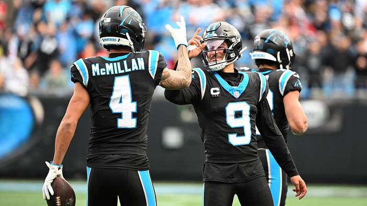 Carolina Panthers quarterback Bryce Young (9) celebrates with wide receiver Tetairoa McMillan 