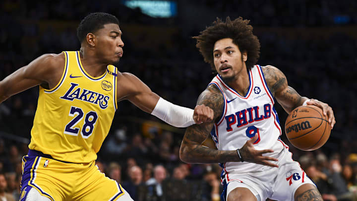 Nov 8, 2024; Los Angeles, California, USA; Philadelphia 76ers guard Kelly Oubre Jr. (9) drives against Los Angeles Lakers forward Rui Hachimura (28) during the first half at Crypto.com Arena. Mandatory Credit: Jonathan Hui-Imagn Images