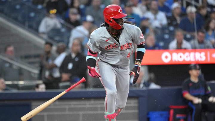 Aug 21, 2024; Toronto, Ontario, CAN;  Cincinnati Reds shortstop Elly De La Cruz (44) hits a single against the Toronto Blue Jays in the fourth inning at Rogers Centre. Mandatory Credit: Dan Hamilton-USA TODAY Sports
