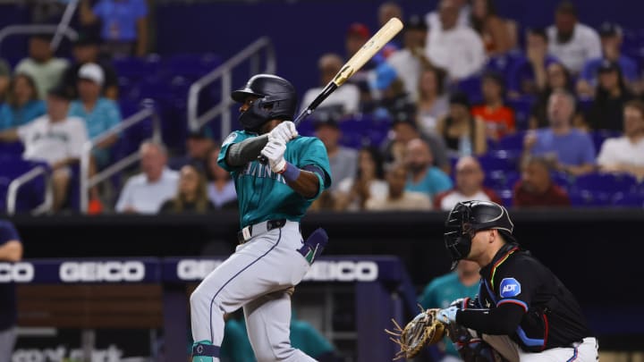 Seattle Mariners second baseman Ryan Bliss (1) hits a single against the Miami Marlins during the fifth inning at loanDepot Park on June 21. Seattle Mariners second baseman Ryan Bliss (1) hits a single against the Miami Marlins during the fifth inning at loanDepot Park on June 21.