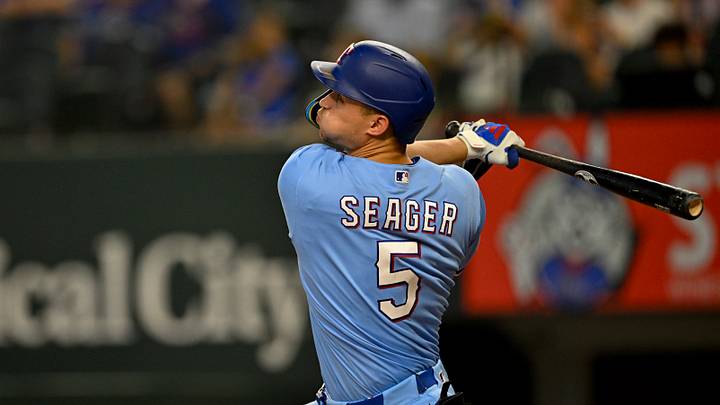 Sep 6, 2026; Arlington, Texas, USA; Texas Rangers shortstop Corey Seager (5) hits a home run during the game between the Rangers and the Rays at Globe Life Field. Mandatory Credit: Jerome Miron-Imagn Images