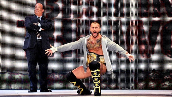 Paul Heyman accompanies CM Punk to ring. Punk cashed in the favor that Heyman owed him at a recent Smackdown event.