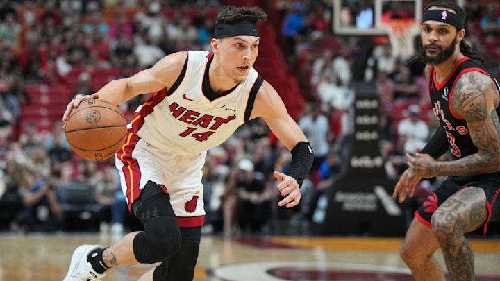 Miami Heat guard Tyler Herro (14) drives to the basket.