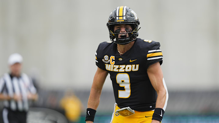 Columbia, Missouri, USA; Missouri Tigers quarterback Beau Pribula (9) celebrates after a run against the Alabama Crimson Tide during the first half of the game at Faurot Field at Memorial Stadium.