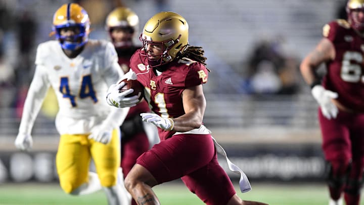 Nov 30, 2024; Chestnut Hill, Massachusetts, USA; Boston College Eagles wide receiver Lewis Bond (11) runs against the Pittsburgh Panthers during the second half at Alumni Stadium. Mandatory Credit: Brian Fluharty-Imagn Images Nov 30, 2024; Chestnut Hill, Massachusetts, USA; Boston College Eagles wide receiver Lewis Bond (11) runs against the Pittsburgh Panthers during the second half at Alumni Stadium. Mandatory Credit: Brian Fluharty-Imagn Images